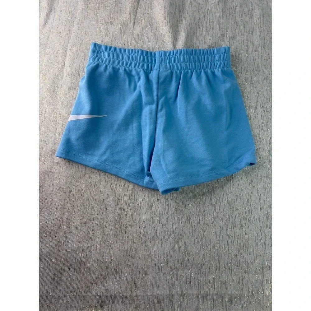 Two pairs of Nike baby blue short size 6